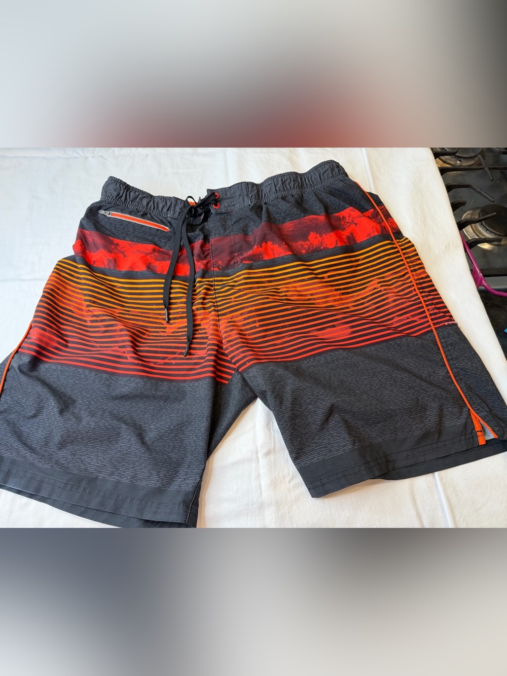 ZeroXposur Black Swim Board Shorts with Red, Orange, and Gray